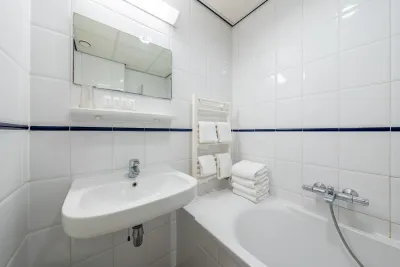 Hotel Noordooster - quadrupel badkamer